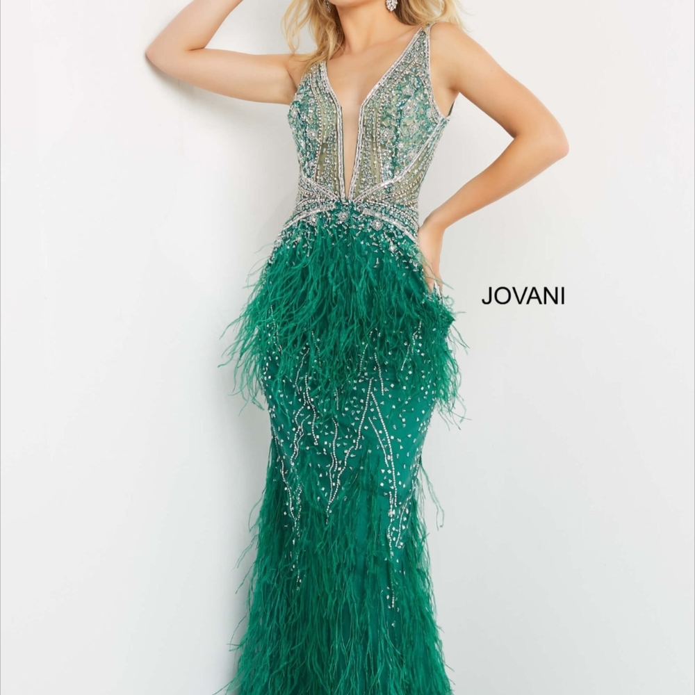 Emerald green sparkly feather Jovani prom dress or pageant evening gown.